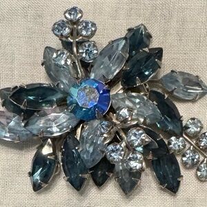 Vintage 3D spray floral brooch, tiered layers of light & dark blue rhinestones.